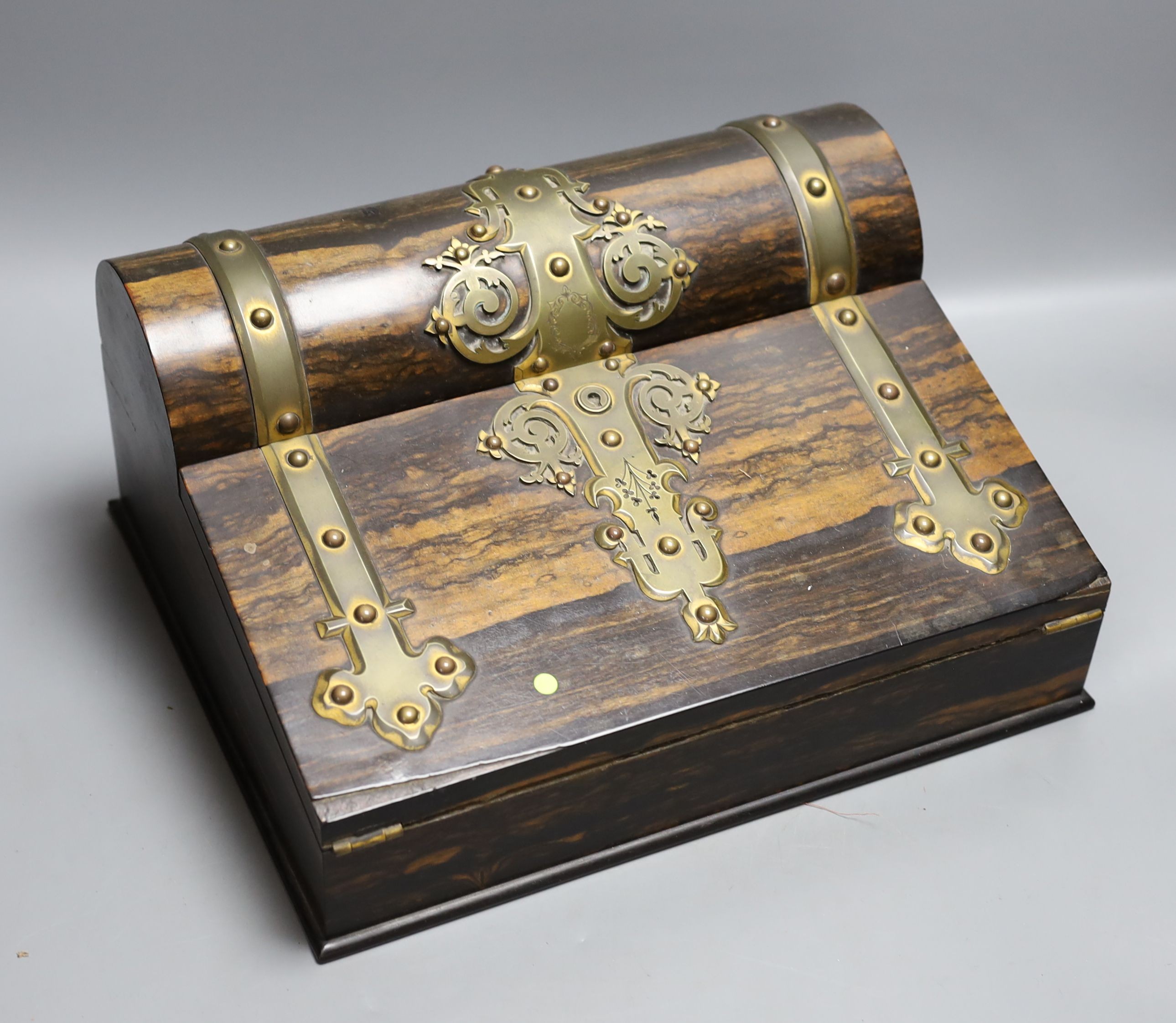 A Victorian coromandel stationery box with brass mounts, 32 cms wide.